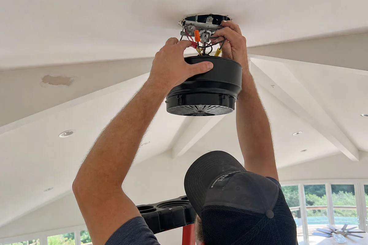 Installing a ceiling fan in a Malibu living room